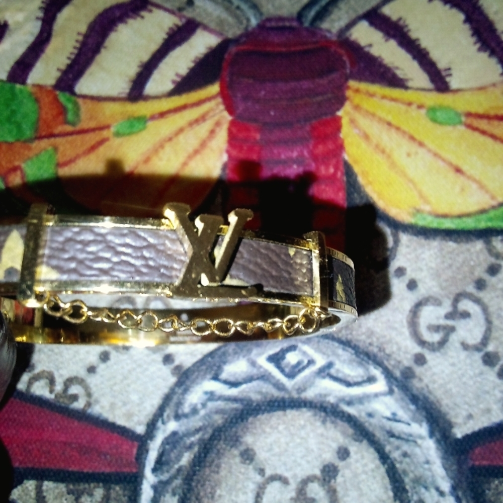 Gold and brown logo bracelet NWOT